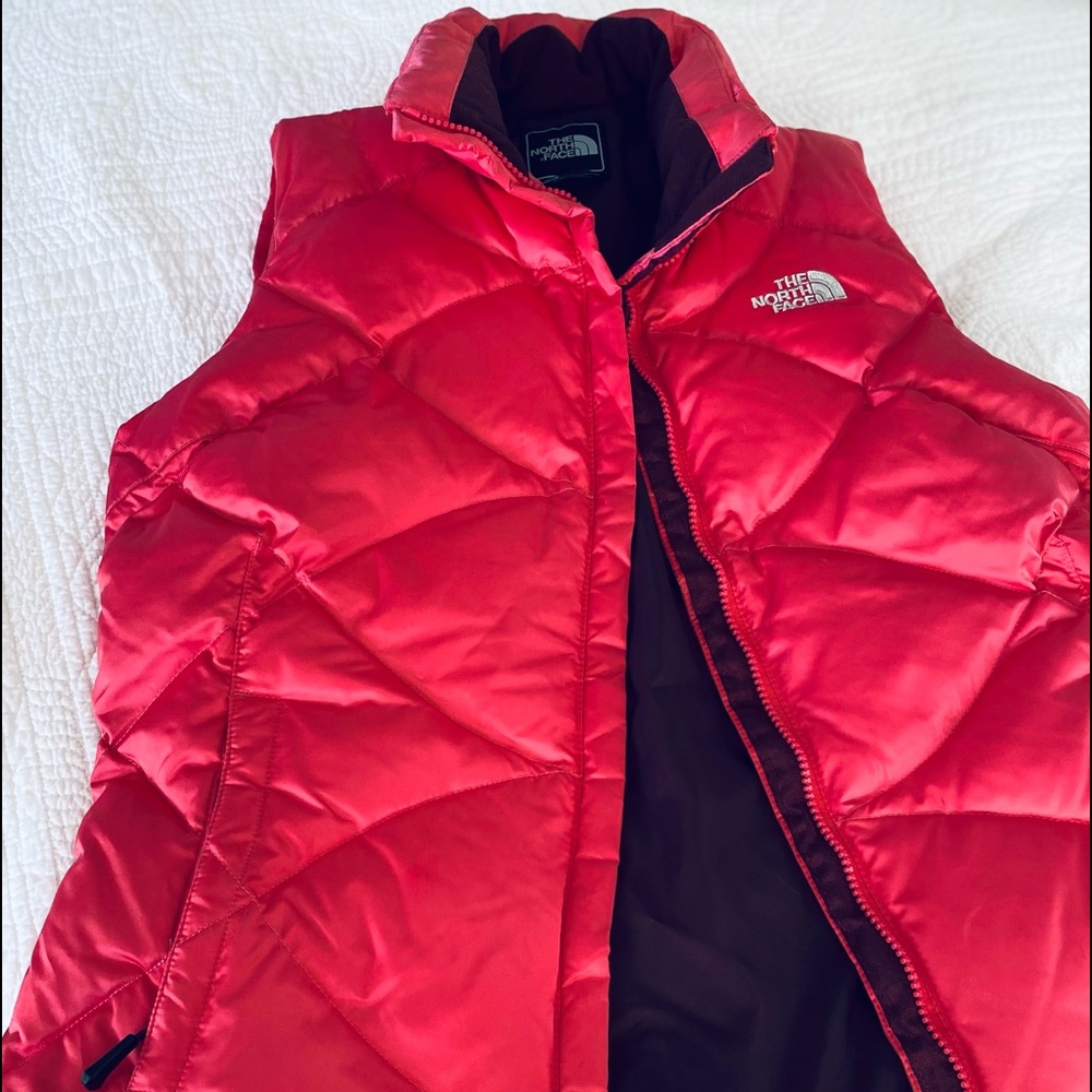 magenta north face vest